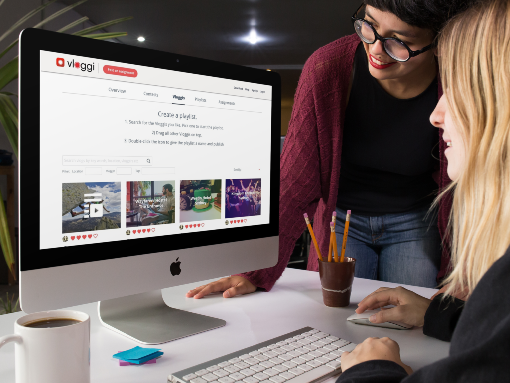 Women-using-vloggi-playlist-compiler.png